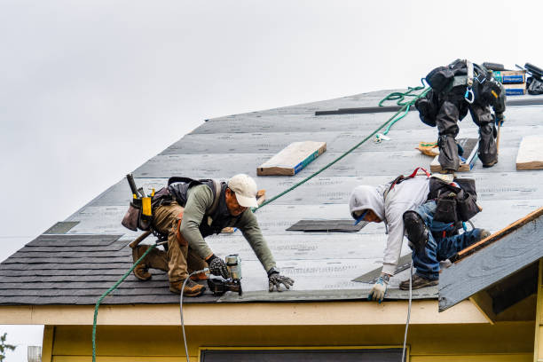 Professional Gutter Installation technician working in Masonville, NY